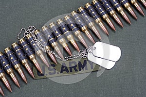 ammunition belt and dog tags on US ARMY uniform