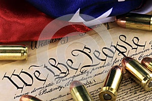 Ammunition and flag on US Constitution - History of the Second Amendment