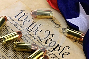 Ammunition and flag on US Constitution - History of the Second Amendment