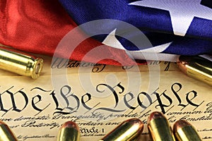 Ammunition and flag on US Constitution - History of the Second Amendment