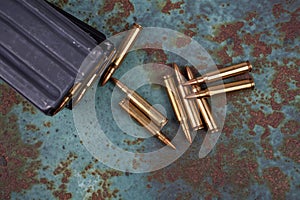 Ammunition with magazine on rusty metal