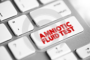 Amniotic Fluid Test is a medical procedure used primarily in the prenatal diagnosis of genetic conditions, text concept button on