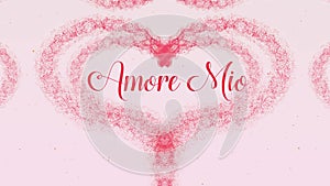 Amore Mio Love confession. Valentine`s Day heart made of pink splash is appearing. Then comes the lettering. The heart