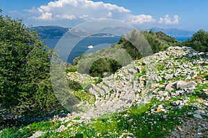 Amos Ancient city ruins and landscape. Kumlubuk beach, sea and mountain. Beauty in nature. Marmaris, Mugla, Turkey. photo