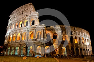 Amphitheatre Colosseum in the city Rome at night