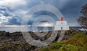 Amphitrite Point Lighthouse and storm clouds