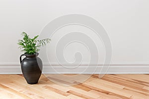 Amphora with green plant decorating a room