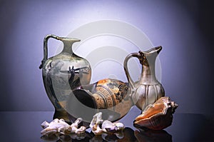 Amphora, the jug and sea shells