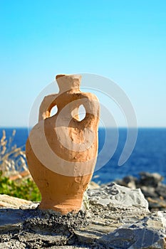 An amphora over the sea photo