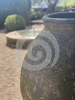 Amphora in a small French village - fountain blurred