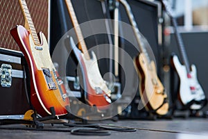 Amplifier with electric guitar on the stage. music instrument set for guitarist. no people