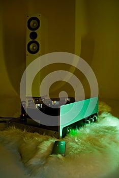 Amplifier and tower speaker