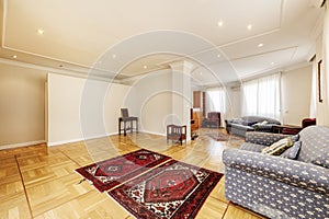 Spacious living room on two levels, wonderful inlaid floors, several upholstered sofas and several photo