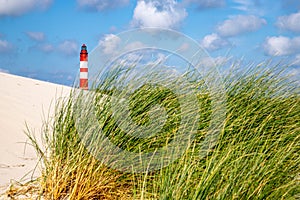 Amrum lighthouse behind dune grass