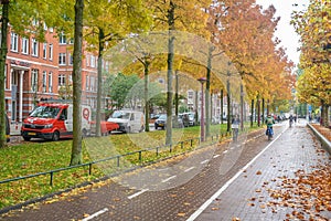 AMSTER, NETHERLANDS - Oct 24, 2019: Amsterdam, Holland - 24 Oct, 2019: Cycle Path in Autumn