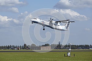 Amsterdam Airport Schiphol - Bombardier Dash 8 of Flybe takes off