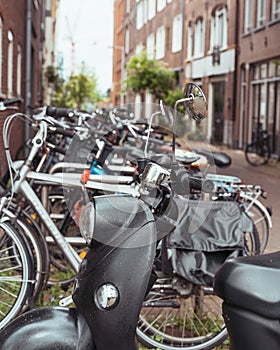Amsterdam alley with parked bicycles in a beautiful neighborhood