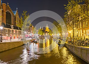 AMSTERDAM - APRIL 29, 2013: Tourists in city center at night. Mo