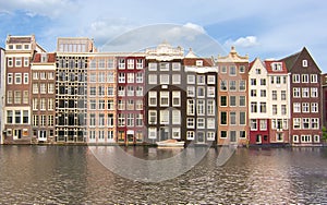 Amsterdam architecture and Damrak canal, Netherlands