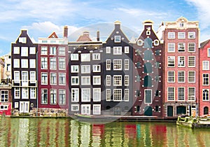 Amsterdam architecture and Damrak canal, Netherlands