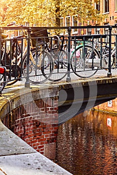 Amsterdam. Bike on the channel bridgeTypical amsterdam