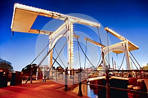 Amsterdam with bridge over canal in Holland