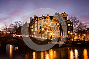 Amsterdam canal houses at dusk