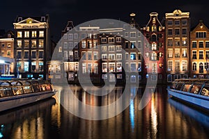 Amsterdam canal houses at night