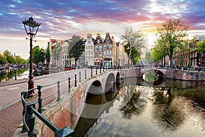 Amsterdam Canal houses at sunset reflections, Netherlands