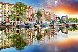 Amsterdam Canal houses at sunset reflections, Netherlands, panorama