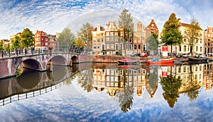 Amsterdam Canal houses vibrant reflections, Netherlands, panora