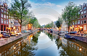 Amsterdam canal Singel with typical dutch houses, Holland, Netherlands.