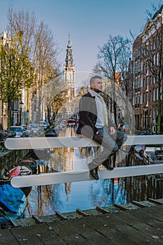 Amsterdam canal with view at the Zuiderkerk Amsterdam church canalside Netherlands