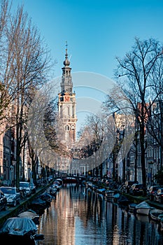 Amsterdam canal with view at the Zuiderkerk Amsterdam church canalside Netherlands