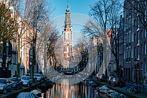 Amsterdam canal with view at the Zuiderkerk Amsterdam church canalside Netherlands