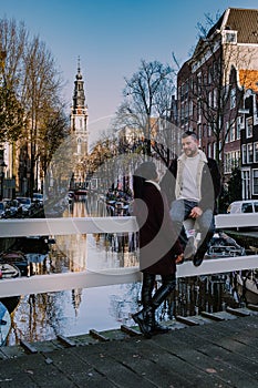 Amsterdam canal with view at the Zuiderkerk Amsterdam church canalside Netherlands