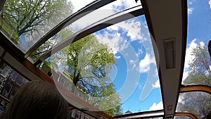 Amsterdam canals boat sunroof slow motion trip sky view