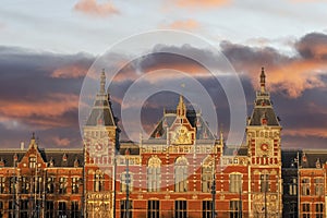 amsterdam central station at sunset