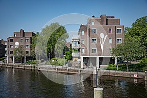 Amsterdam in Holland with its magnificent brunch breakfast canals, its levi barge bridge and traditional boat, flowery city