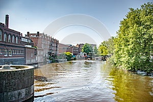 Amsterdam in Holland with its magnificent brunch breakfast canals, its levi barge bridge and traditional boat, flowery city bike