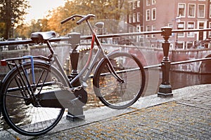 Amsterdam, Holland, Netherlands. Romantic canal bridge, retro bi