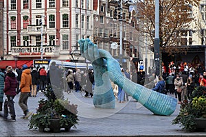 Amsterdam Leidseplein Street View with Hands Sculpture Monument, Netherlands photo