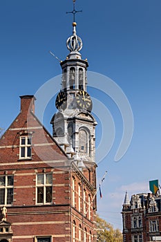 AMSTERDAM, NETHERLANDS - APRIL 14, 2019: Munttoren clock tower in Amstedam
