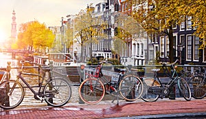 Amsterdam Netherlands. Bikes over canals of amsterdam city