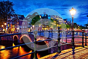 Amsterdam, Netherlands. Bridges with nighttime illumination