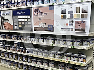 Assortment of various Flexa paint containers.