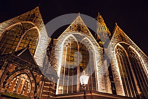 AMSTERDAM, NETHERLANDS - JANUARY 22 2016: City streets of Amsterdam at night. General views of city landscape on January 22, 2016