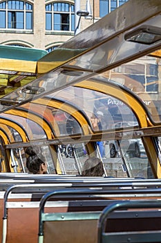 Tourists inside the pleasure boat in Amsterdam