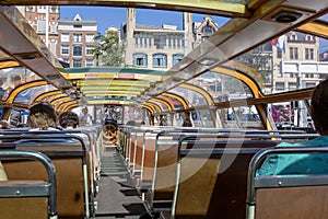 Tourists inside the pleasure boat in Amsterdam