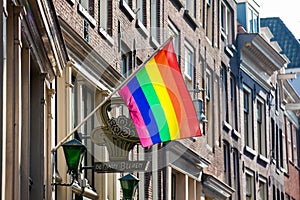 Bet van Beeren CafÃÂ© `t Mandje and the LGBT flag at the Old Central district in Amsterdam